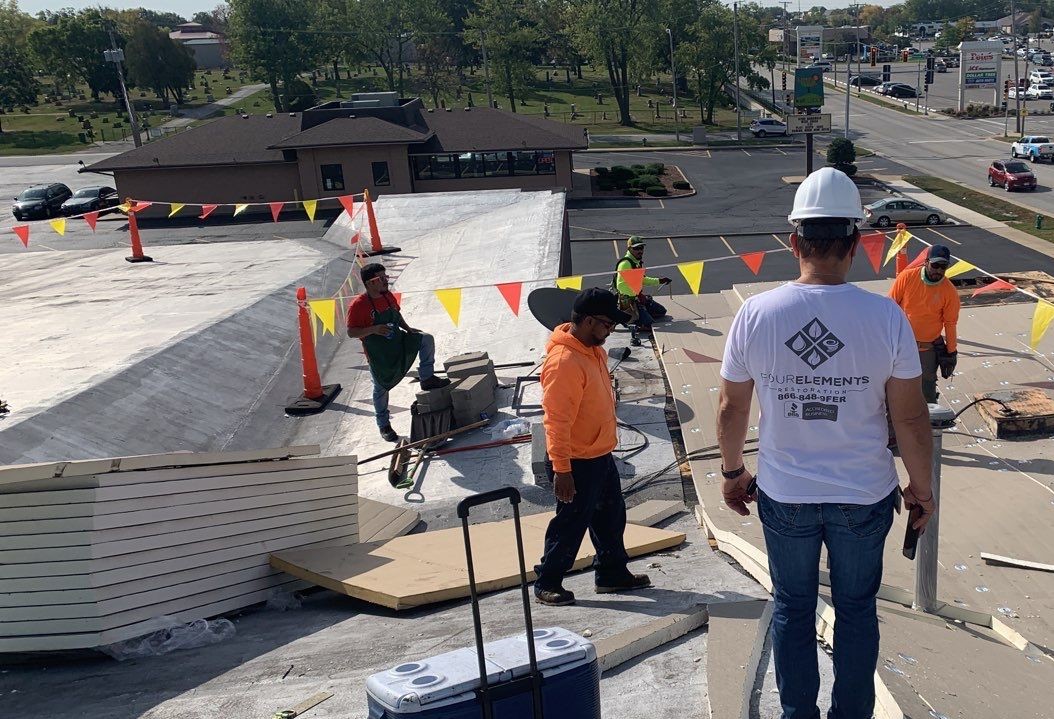 four elements tpo roof cost